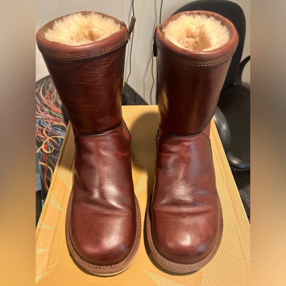 Authentic UGG Boots gently used well cared for rare style. Easy on and off zip!!